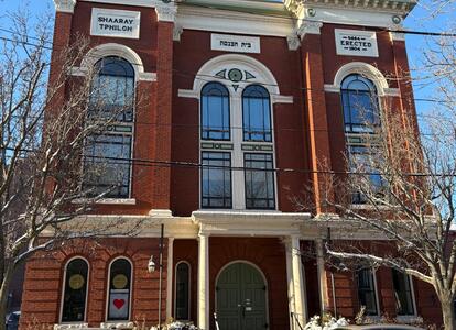 An external view of Shaarey Tphiloh Synagogue on Newbury Street in 2025. The building is now condos.